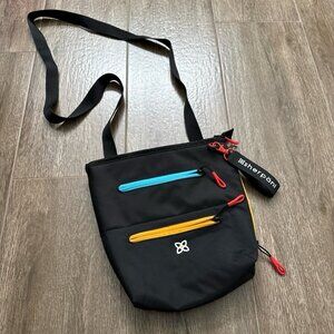 Sherpani Sadie Crossbody Bag with Strap Pocket Chromatic black with colorful zip